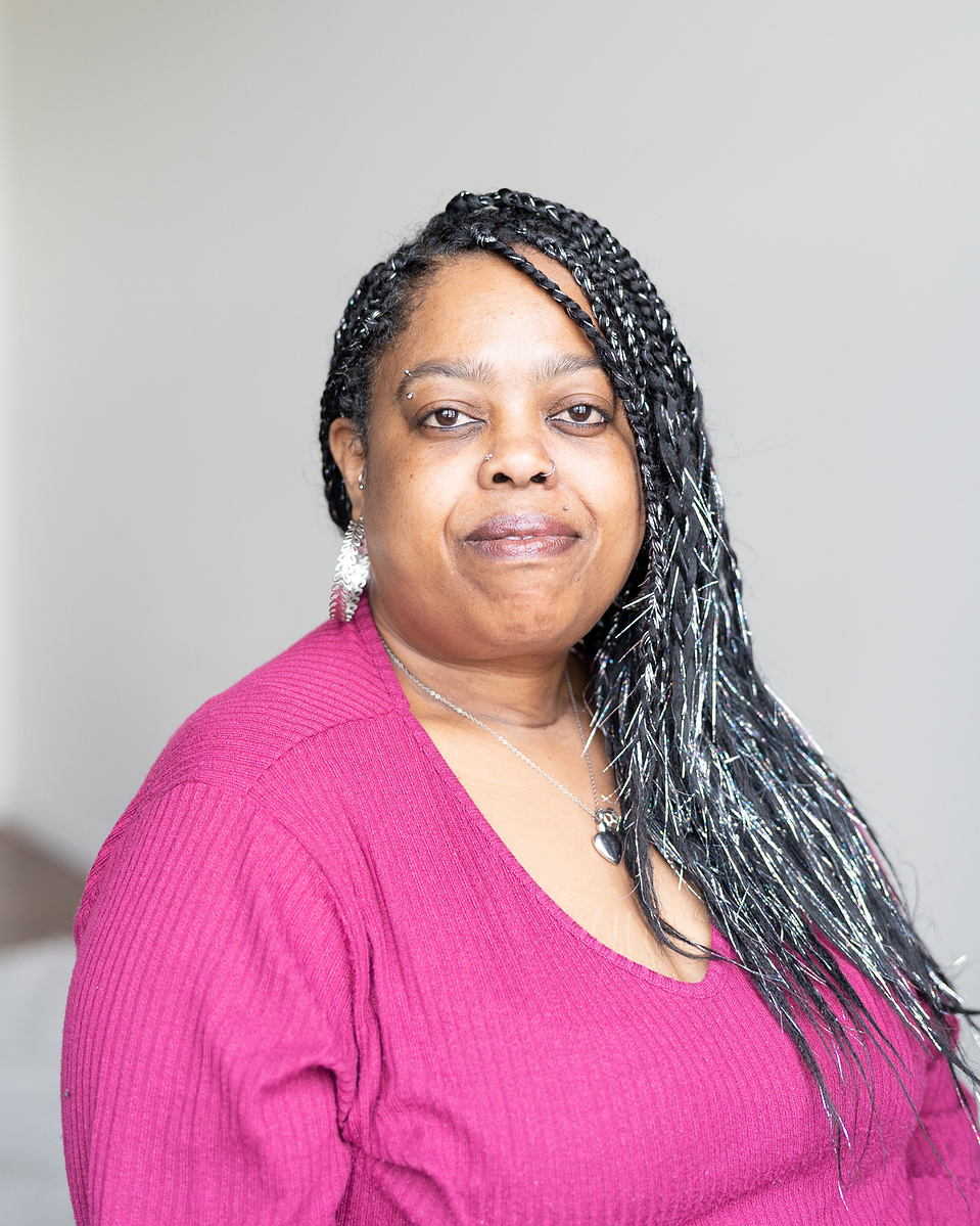 Headshot of black woman with a serious face