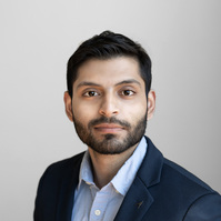 Professional business headshot with a white background
