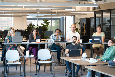 Employees sitting in a meeting