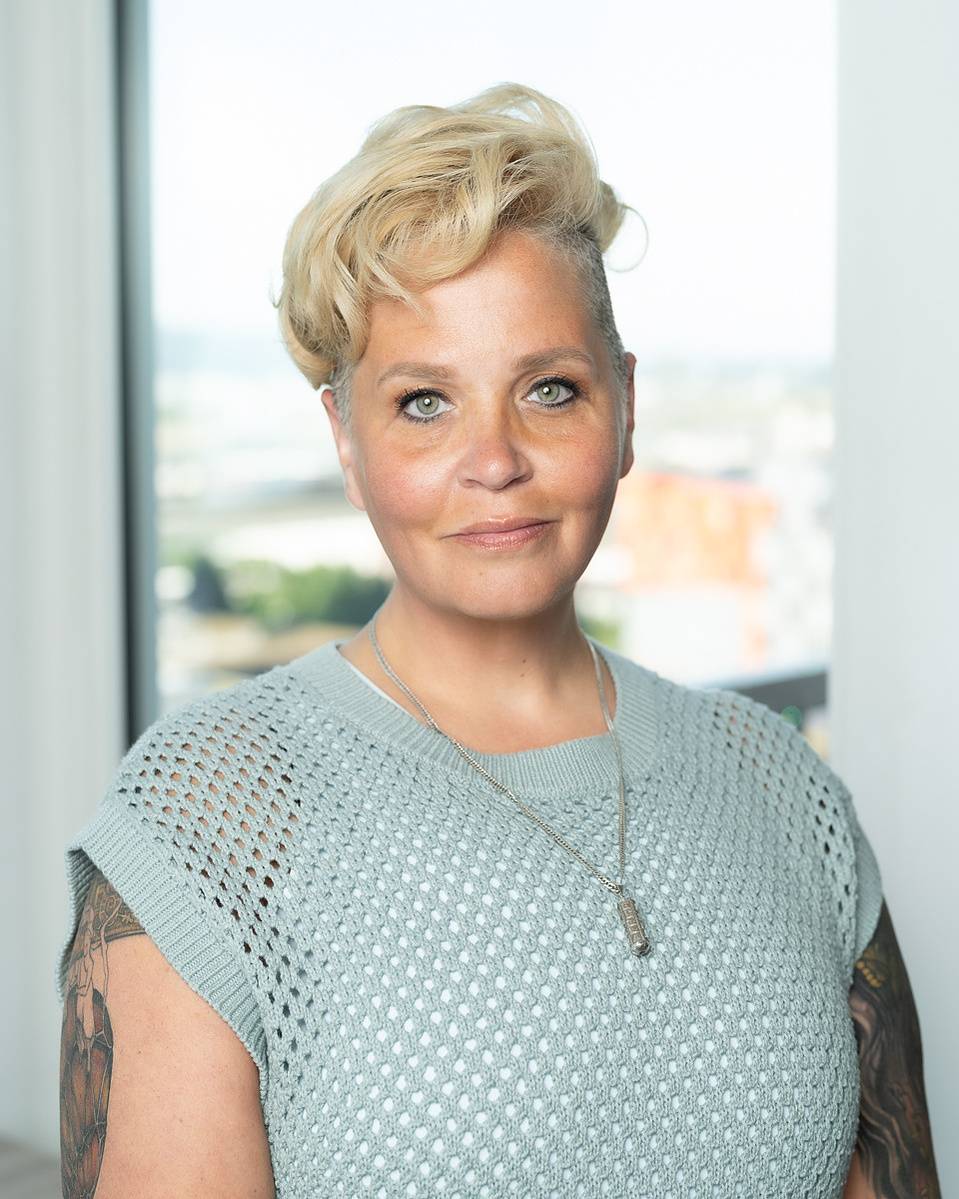 Professional headshot of business woman in casual wear