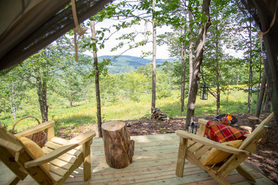 Outdoor travel photography of Adirondack chairs in Vermont.