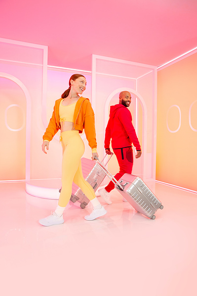Walter and Kat from obe pose for an advertising campaign with American Airlines