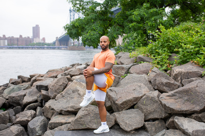 obe instructor Walter Kemp posing outdoors in Brooklyn Bridge Park.