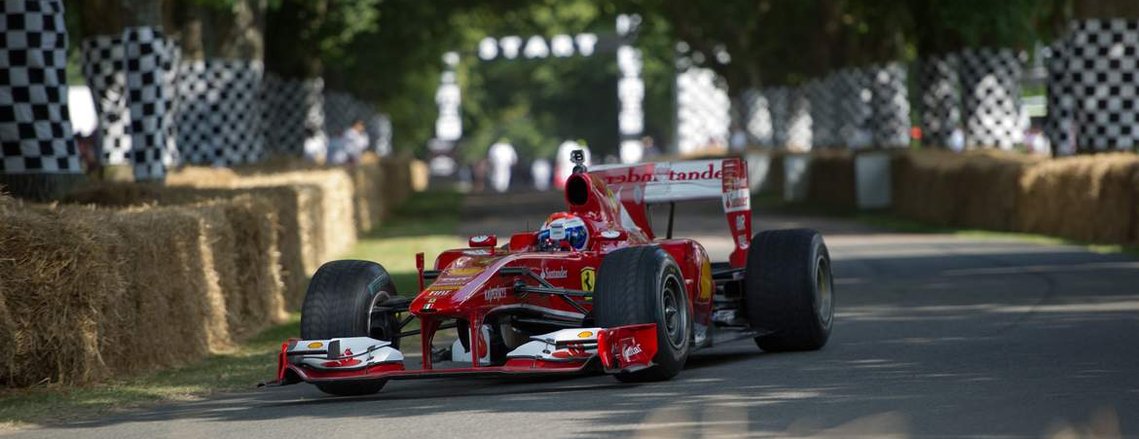 Ferrari F1 car on the first corner of The Goodwood Festival of Speed Hillclimb