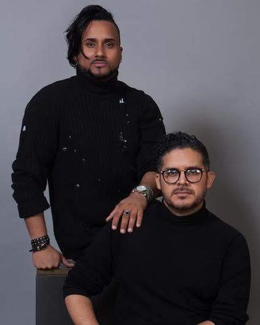 Victor Lopez (seated) pictured with Creative Director Eduardo Rosario (standing)