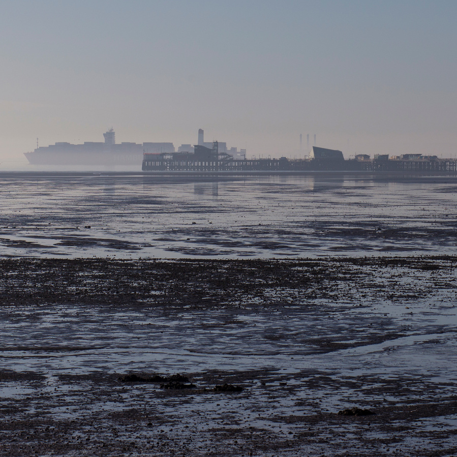 Southend Pier and passing ship, photographic print.