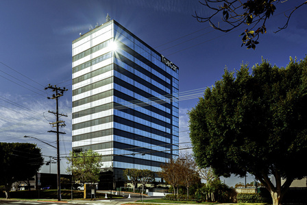 Truecar building shining behind trees on Sepulveda Boulevard, Palms, West Los Angeles, 90034. 