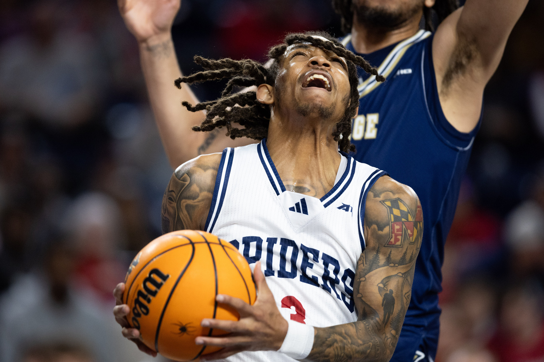 University of Richmond guard DeLonnie Hunt fights for a basket during a basketball game against George Washington University at the Robins Center in Richmond, Va., on Wednesday, Jan. 24, 2024.
