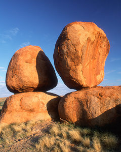 The Devils Marbles are huge granite boulders scattered across a wide, shallow valley, 100 kms south of tennant creek in the northern territory, Australia.