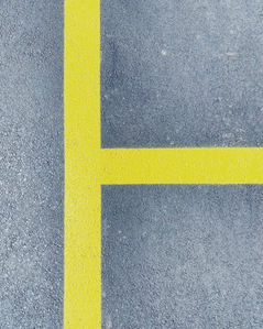 Urban architecture in Zurich – Ground with parking yellow line.
