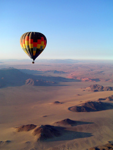 Travel photographer Switzerland from Switzerland – hot air balloon over the namib desert.
