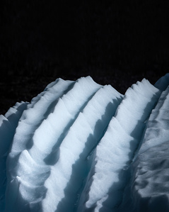 Detail photograph of structure and shape of iceberg.