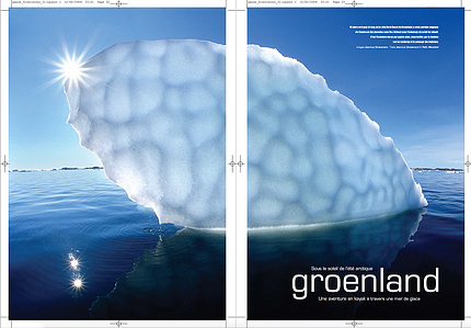 Publication tearsheet of a spread page showing a huge iceberg with a strange cell pattern backlit by the midnight sun in north Greenland.