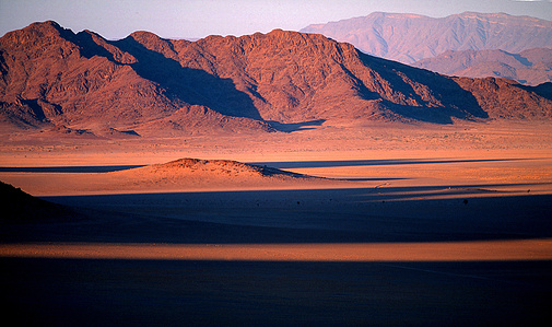 Landscape photographer Switzerland – Sunset at Naukluft national park, Namibia.