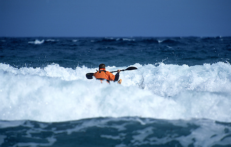 Even after the storm subsided, the surf was still big enough that we waited many long minutes, timing the wave sets, poised for the right moment to paddle out through the breakers.