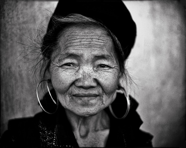 Hmong woman, Sapa, Vietnam – the Hmong are an ethnic group from the mountainous regions of China, Vietnam, Laos, and Thailand.