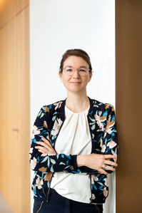 Employee business portrait with office background photographed by photographer  in Zurich.