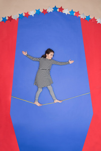 Knolling photography in the studio in Zurich, Switzerland – Balancing girl at theater.