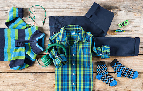 Knolling photography in photo studio for Migros – Children wear.