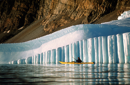 Paddling through a sea of ice off Greenland’s northwest coast, in the endless summer days of the midnight sun.