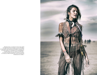 Publication tearsheet of a Burner posing at the Burning Man Gathering.
