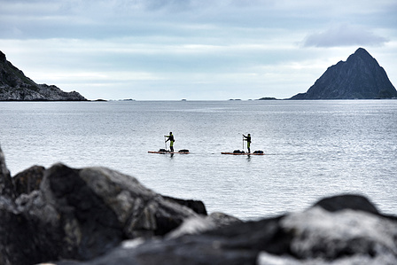 Travel Reportage in Norway - Two Stand up Paddler paddling in Norway.