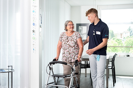 Nurse helping a senior person in Zug, Switzerland.