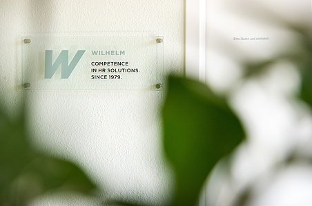 Reportage photography in Zurich – Logo of corporate photographed through plants.
