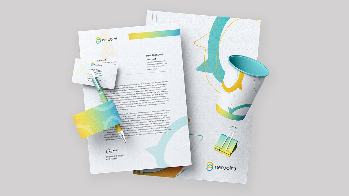 Brand Stationery floating on a grey background
