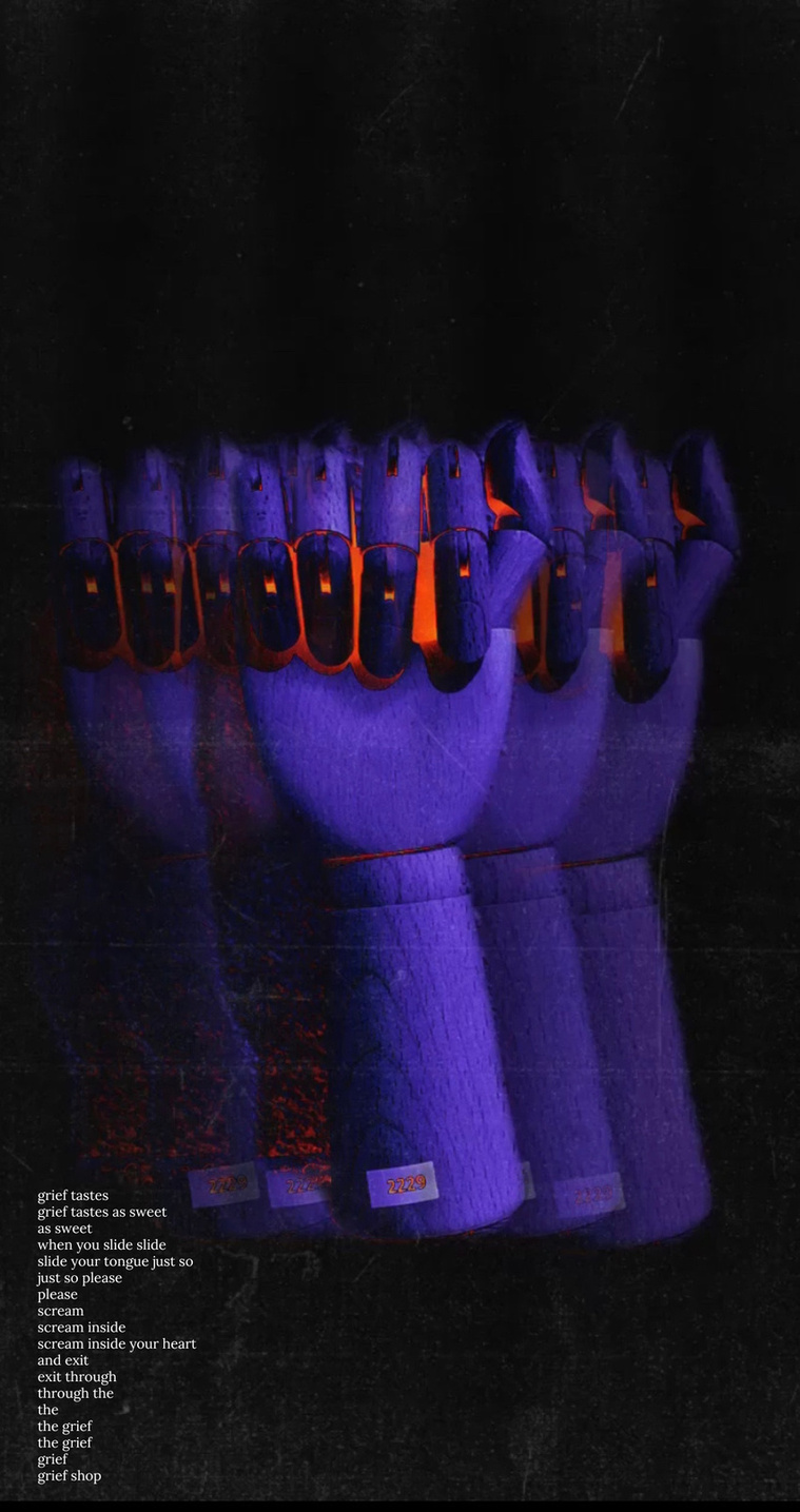 Black background, wooden hand in a fist, filter on photograph shows hand as purple with orange/red in the fist