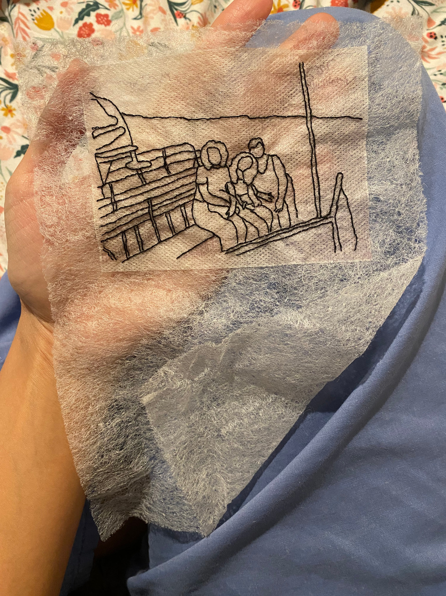 embroidery of an airboat in the Everglades with a woman, a child leaning her head on the shoulder of a second woman sitting on the airboat. The embroidery only uses black to outline the image.