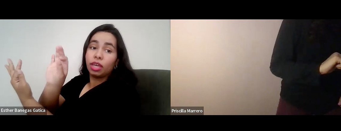two zoom squares with Esther on the left pretending to write something midair and Priscilla on the right only showing half of her torso and one hand folded in to her stomach