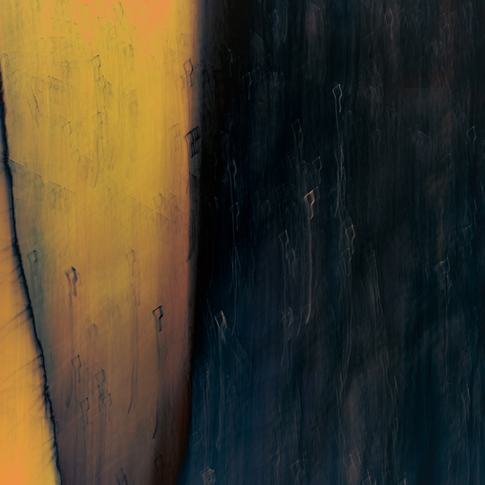 Abstract art of yellow and dark blue colour areas.