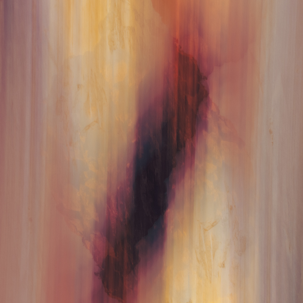 Abstract art of reds and yellow hues.