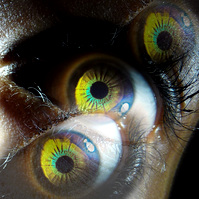 3 eyes overlayed on top of each other.