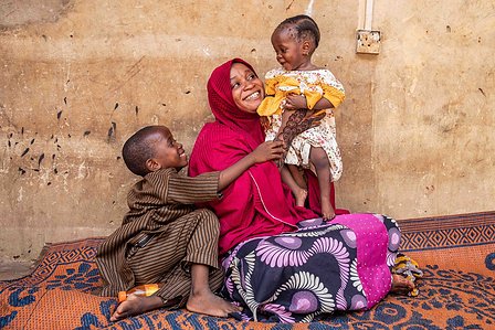 SOKOTO, NGA - July 3, 2023: Family portrait of Hafsat Abubakar, her brother; Ismail Abubakar and her mum; Sadiya Abubakar in their home at Gidan Igwai, Sokoto North LGA, Nigeria. CREDIT: Taiwo Aina 
