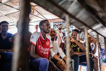 LAGOS, NGA - April 28, 2024: Atmosphere at viewing center in Festac as fans watch Premier league - Arsenal vs Totteham match. Arsenal won the game as final score was 2 -3 to Totteham. CREDIT: Taiwo Aina for New York Times.