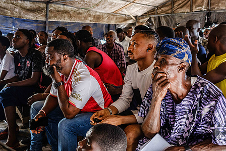 LAGOS, NGA - April 28, 2024: Adeshina Mayowa Karonwi; 45, in a viewing center in Festac watches Premier league - Arsenal vs Totteham match. Arsenal won the game as final score was 2 -3 to Totteham. Mayowa has been a supporter of Arsenal since 1994. CREDIT