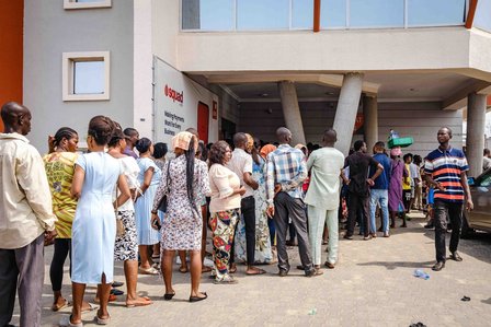 LAGOS, NGA - FEBRUARY 13, 2023: ATM queues gets longer as new Naira is scare, SMEs depends on cash to transact. CREDIT: Taiwo Aina for The New York Times