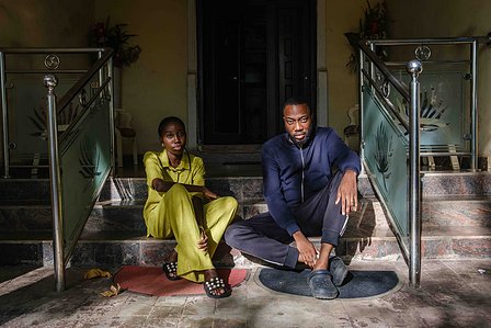 ABUJA, NGA - DECEMBER 5, 2023: Portrait of Nkem Azinge and her younger brother; Eliza Azinge who lives with sickle cell disease in their parents home, Wuse, Abuja, Nigeria. She and her brother are both very ill from the disease so time is running out for 