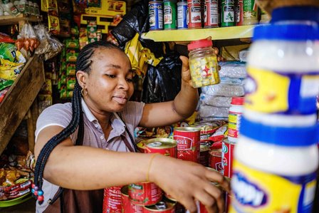 LAGOS, NGA - FEBRUARY 13, 2023: Portrait of Waliat Oriyomi, a 32 year old youth who sells provisions in Bariga market. CREDIT: Taiwo Aina for The New York Times