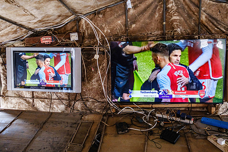 LAGOS, NGA - April 28, 2024: Atmosphere at viewing center in Festac as fans watch Premier league - Arsenal vs Totteham match. Arsenal won the game as final score was 2 -3 to Totteham. CREDIT: Taiwo Aina for New York Times.