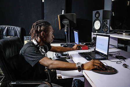 LAGOS, NGA - FEBRUARY 13, 2023: Portrait of Wisdom Odeje, a 34 year old Nigerian youth in his sound studio. CREDIT: Taiwo Aina for The New York Times