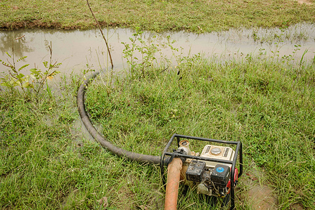 YOLA, NGA - October 4, 2023: Shaibu Mohammed uses his irrigation system in his farm located in Dasin Hausa community, Fufoire LGA, Adamawa State Nigeria. Shaibu Mohammed is a beneficiary of Google climate resilency project. After receiving cash, he also p