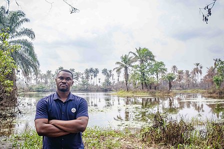 RIVERS, NG - January 27, 2023:  Portrait of Asanga Fabian in front of the land farming area destroyed due to oil spillage activities on January 27, 2022 in Rivers state, Nigeria. CREDIT: Taiwo Aina for Oxfam Novib