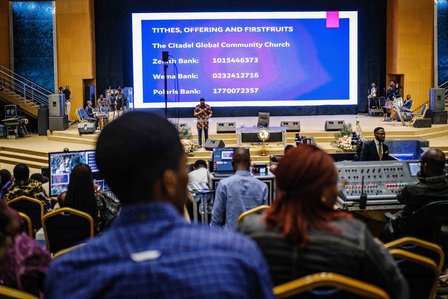 LAGOS, NGA - FEBRUARY 12, 2023: Ongoing church service on February 12, 2023 in Global Citadel Community Church, Lagos, Nigeria. Churches now receive tithes and offerings digitally, there is no much cash flow in churches either. CREDIT: Taiwo Aina for The 