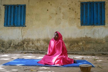 MAIDUGURI, NGA - April 11, 2024: Portrait of Saratu Dauda; 26, in Maiduguri. Saratu was abducted at age 16 on April 14, 2014, by Boko Haram, then married off to one of the terrorists. This was because she was given the option to either marry or be a slave