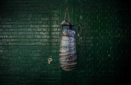 A punching bag in a gym, from Game of confidence by Taiwo Aina 