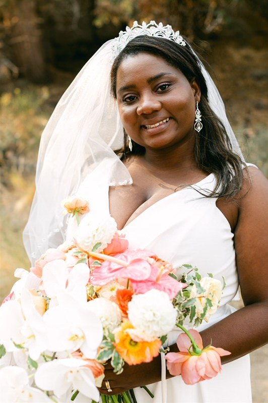 glowing bride celebrating her wedding at the riverhouse lodge in bend oregon on the deschutes river