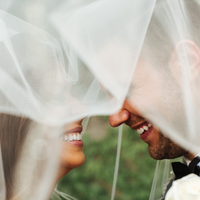 bride and groom under veil wedding photography ideas at the Pine Knob Mansion Detroit Wedding
